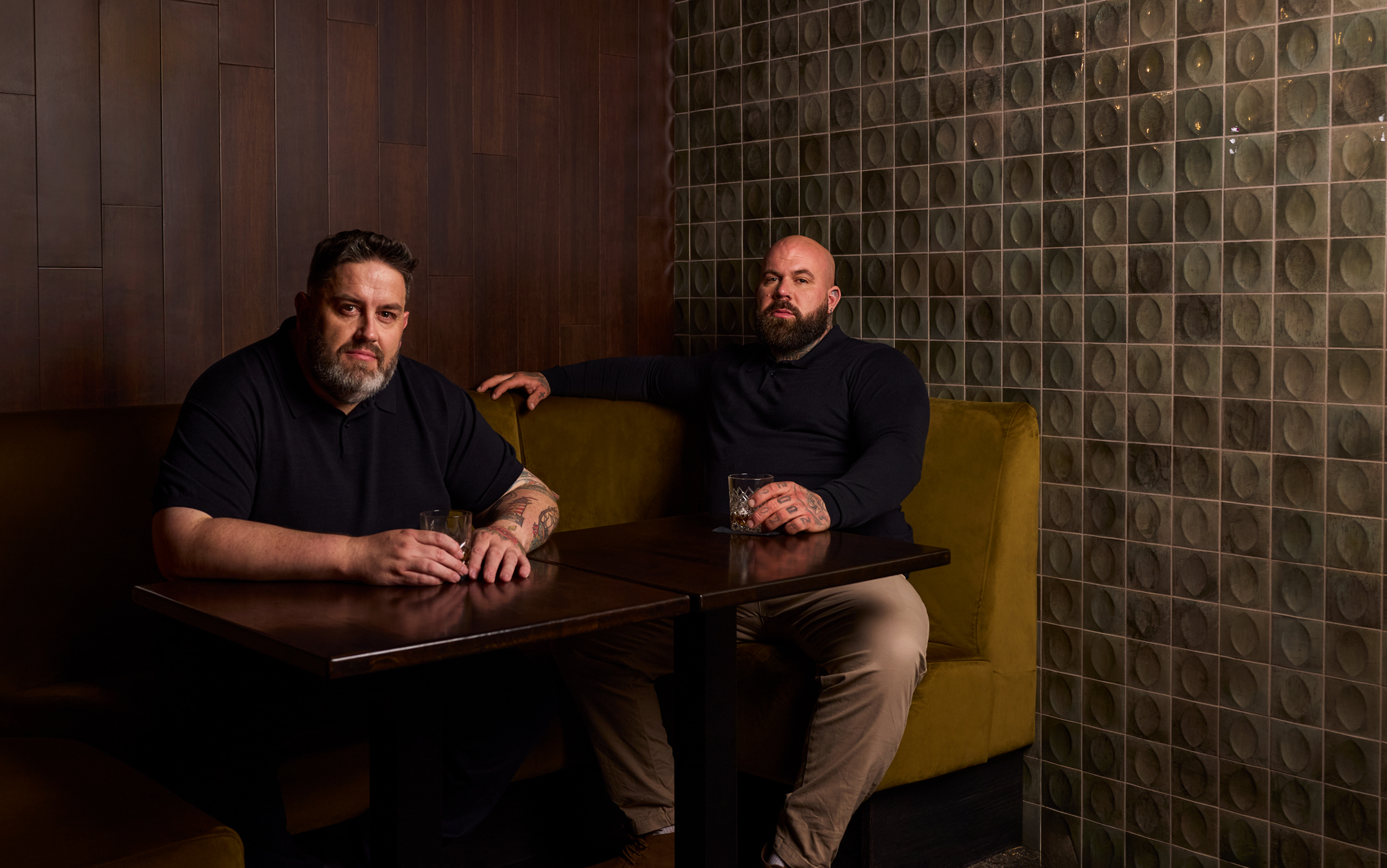 2 plus size men sitting in the pub